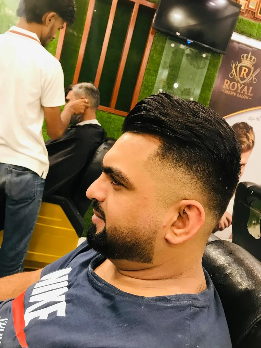 Haircut and beard styling by Royal Men's Salon