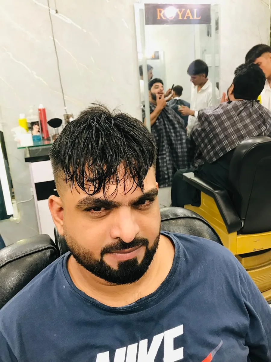 Haircut and beard styling by Royal Men's Salon